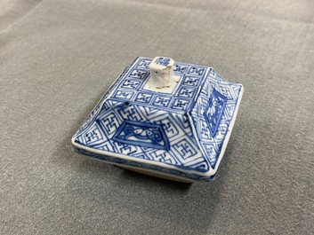 A pair of Chinese blue and white square vases and covers, Kangxi