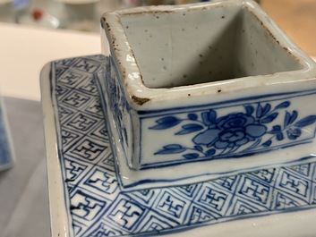 A pair of Chinese blue and white square vases and covers, Kangxi