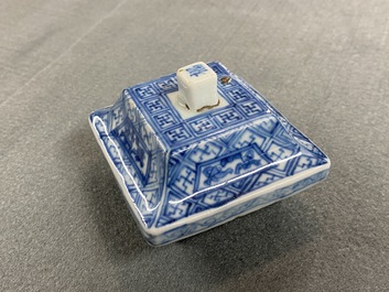 A pair of Chinese blue and white square vases and covers, Kangxi