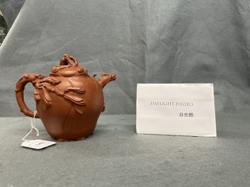 A Chinese Yixing stoneware lotus-shaped teapot and cover, Kangxi