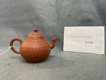 A Chinese Yixing stoneware dragon-spouted teapot and cover, Kangxi