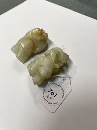 Two Chinese celadon jade figures of boys, 19/20th C.