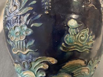 A Chinese fahua vase with mandarin ducks in a lotus pond, Ming