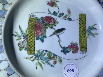 A Chinese famille rose 'ruby back' plate with a bird on a blossoming branch, Yongzheng