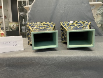 A pair of Chinese blue and white yellow-ground vases, 19th C.