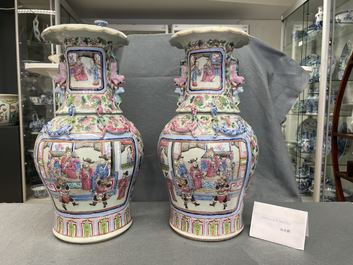 A pair of Chinese famille rose 'court scene' vases, 19th C.