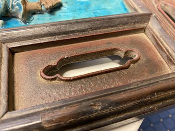 A Chinese square fahua 'Immortals' plaque mounted in a wooden table screen, Ming