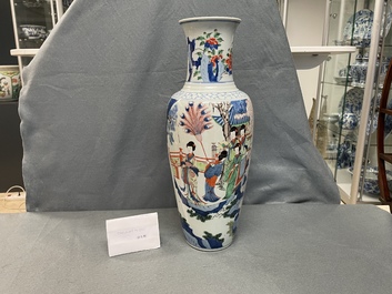 A Chinese wucai vase with continuous figurative design, 19th C.