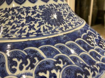 A large Chinese blue and white 'hu' vase with floral scrolls, Qianlong mark, 19th C