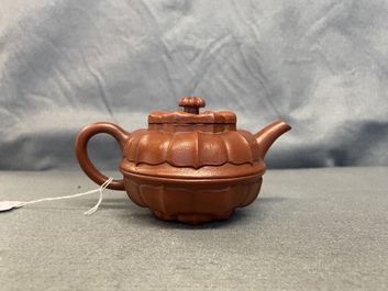 A Chinese Yixing stoneware teapot and cover, Kangxi