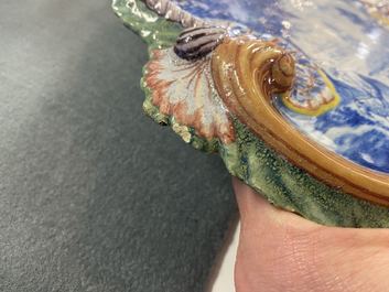 Een paar polychrome Delftse plaquettes met plattelandsvoorstellingen, 19e eeuw