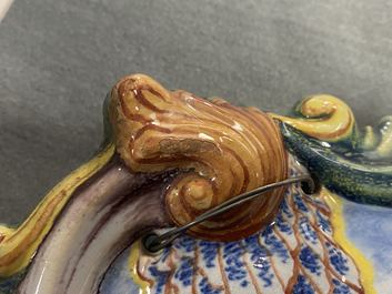 Een paar polychrome Delftse plaquettes met plattelandsvoorstellingen, 19e eeuw