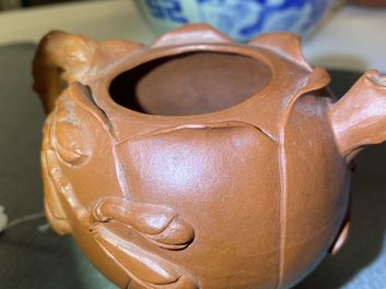 A Chinese Yixing stoneware lotus-shaped teapot and cover, Kangxi