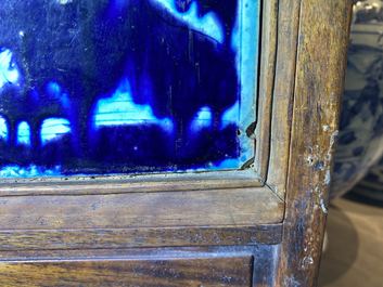 A Chinese square fahua 'Shou Lao' plaque mounted in a wooden table screen, Ming