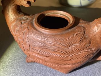 A Chinese Yixing 'phoenix' stoneware teapot and cover, Kangxi