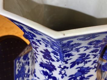 A Chinese blue and white hexagonal 'hu' vase with floral design, Qianlong mark, 19th C.