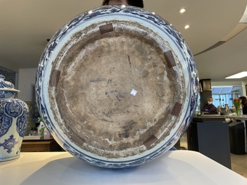 An exceptionally large Chinese blue and white 'lotus scroll' fish bowl, Kangxi