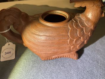 A Chinese Yixing 'phoenix' stoneware teapot and cover, Kangxi