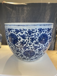 An exceptionally large Chinese blue and white 'lotus scroll' fish bowl, Kangxi