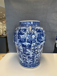 A massive Chinese blue and white vase with floral and landscape panels, Kangxi
