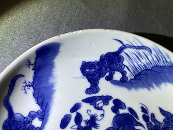 A Chinese blue and white 'mythical beasts' dish, Shunzhi mark and of the period
