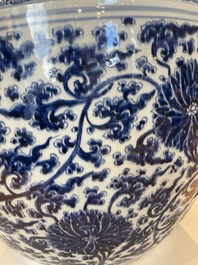 An exceptionally large Chinese blue and white 'lotus scroll' fish bowl, Kangxi