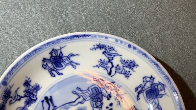 Six Chinese blue and white cups and eight saucers with horseriders, Kangxi