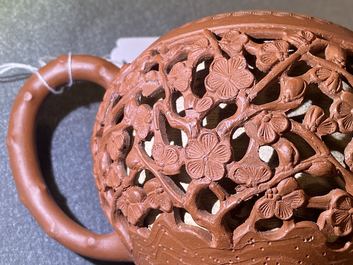 A Chinese reticulated Yixing stoneware teapot and cover, Kangxi