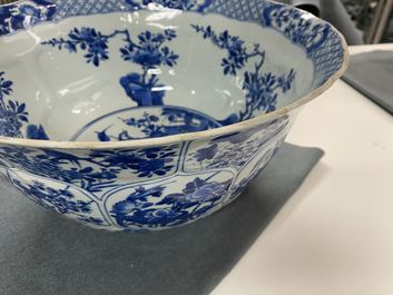 A large Chinese blue and white bowl with floral panels, Kangxi
