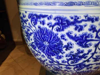 An exceptionally large Chinese blue and white 'lotus scroll' fish bowl, Kangxi