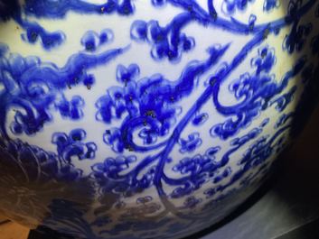 An exceptionally large Chinese blue and white 'lotus scroll' fish bowl, Kangxi