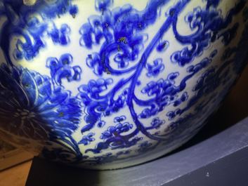 An exceptionally large Chinese blue and white 'lotus scroll' fish bowl, Kangxi