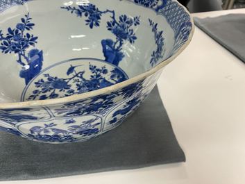 A large Chinese blue and white bowl with floral panels, Kangxi