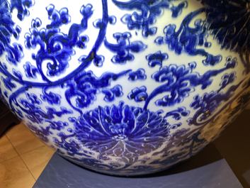 An exceptionally large Chinese blue and white 'lotus scroll' fish bowl, Kangxi