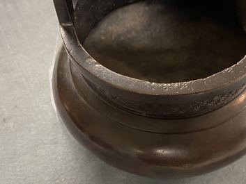 A Chinese bronze tripod censer, seal mark, Yuan