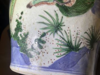 A Chinese wucai 'mythical beasts' vase and cover, Transitional period