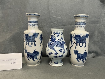 A pair of Chinese blue and white 'mythical beasts' vases and a pear-shaped 'dragon and phoenix' vase, 19th C.