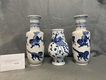 A pair of Chinese blue and white 'mythical beasts' vases and a pear-shaped 'dragon and phoenix' vase, 19th C.