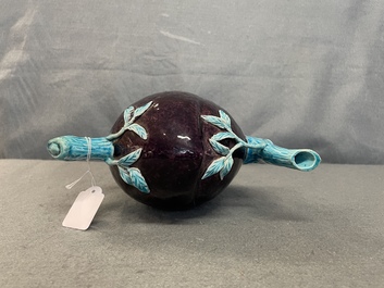 A Chinese aubergine- and turquoise-glazed peach-shaped cadogan teapot, 18/19th C.