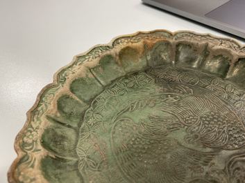 A Chinese green-glazed lotus-shaped 'phoenix' dish, Yuan