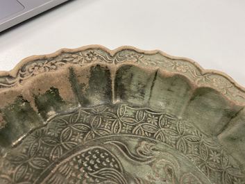 A Chinese green-glazed lotus-shaped 'phoenix' dish, Yuan