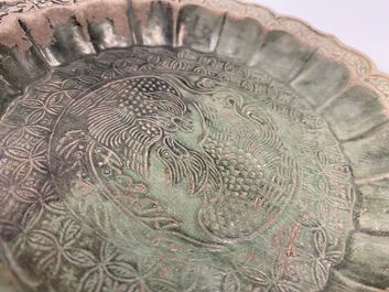 A Chinese green-glazed lotus-shaped 'phoenix' dish, Yuan