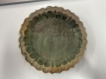 A Chinese green-glazed lotus-shaped 'phoenix' dish, Yuan