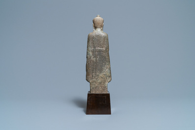 Une figure de Bouddha en pierre sculpt&eacute;e, Khmer, Lopburi, 12/14&egrave;me