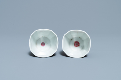 A pair of Chinese octagonal famille rose cups and saucers, Qianlong