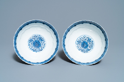 A pair of Chinese famille verte caf&eacute;-au-lait-ground lotus-molded bowls, Kangxi