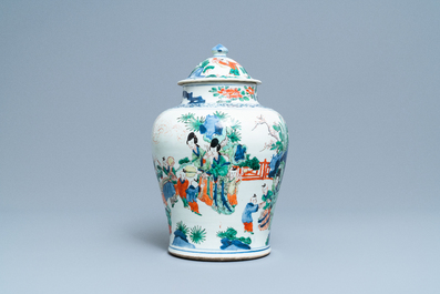 A Chinese wucai 'playing boys' vase and cover, Transitional period