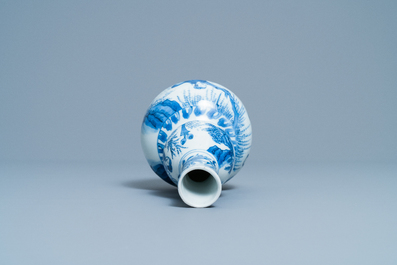A Chinese blue and white double gourd vase with figures in a landscape, Transitional period