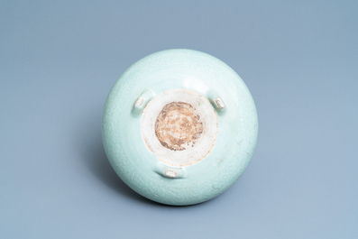 A Chinese celadon-glazed tripod censer with incised underglaze design, Kangxi