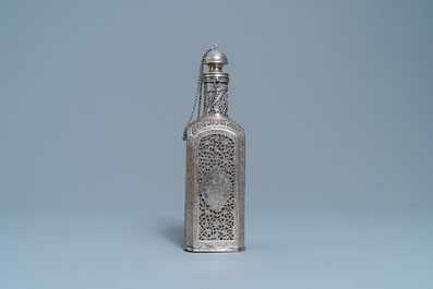 A reticulated Qajar silver flask with glass insert, Iran, 19th C.